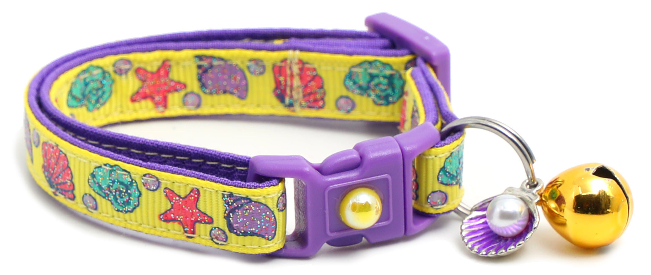 Beachcomber Breakaway Cat Collar in vibrant colors, featuring a breakaway clip and removable bell, made from soft reinforced cotton.